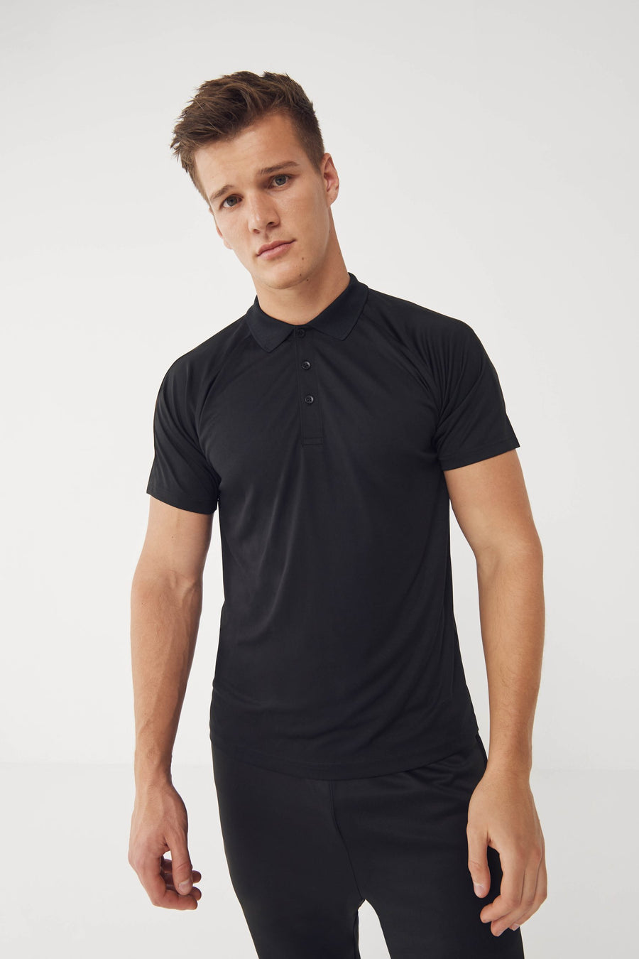 Finden + Hales Team Polo Shirt LV291 - model lifestyle